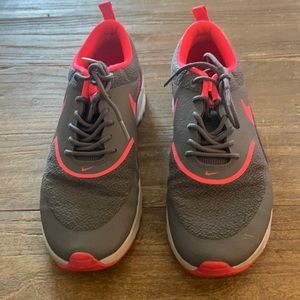 Pink and grey Nike shoes